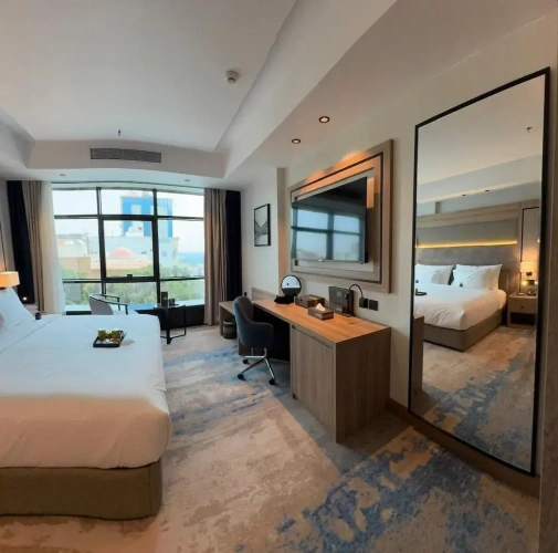 Deluxe Suite with partial sea view