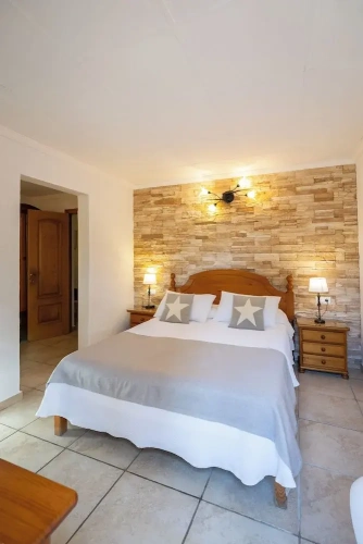 Standard Triple room with balcony and with garden view