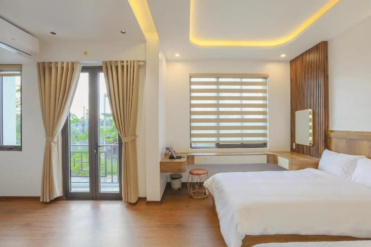 Deluxe Quadruple room with balcony and with garden view