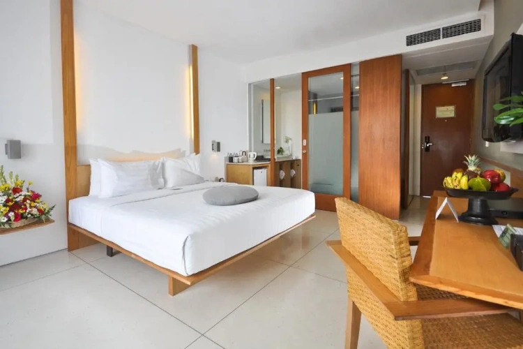 Haven Deluxe room with balcony and with pool view