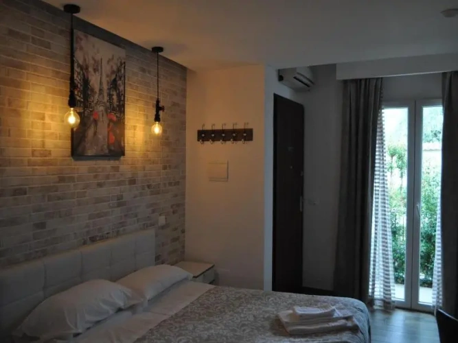 Classic Quadruple room with balcony