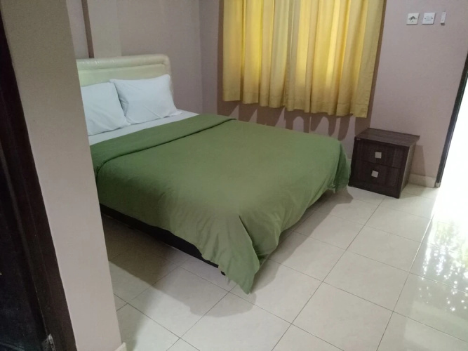 Purnama House