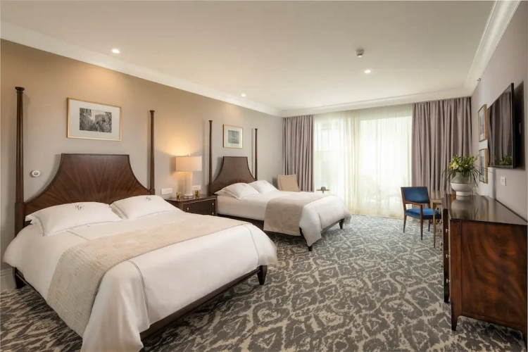 Deluxe Quadruple room with balcony