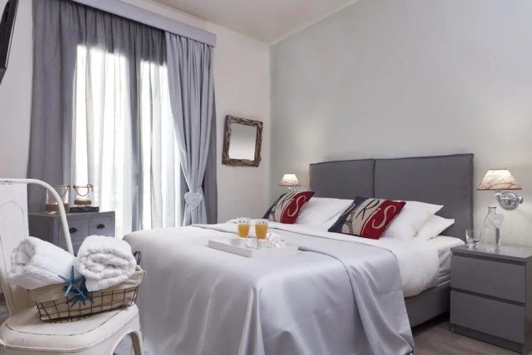 Superior Triple room with balcony and with partial sea view