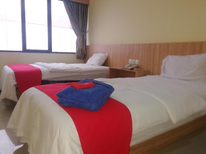 Standard Twin room with garden view