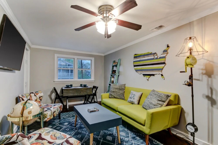 Vibrant, Colorful Condo Building With Backyard Firepit and Games