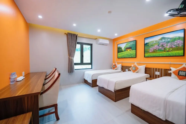 Standard Triple room with garden view