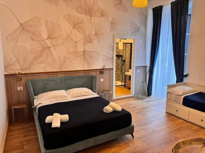 Deluxe Quadruple room with balcony and with sea view