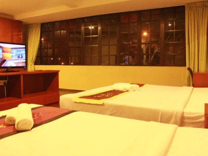 Deluxe Triple Family Suite with mountain view