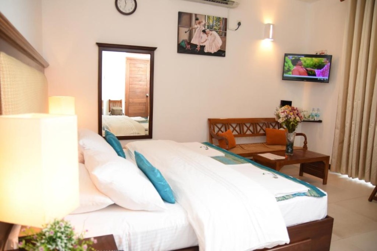 Deluxe Triple room with balcony and with sea view