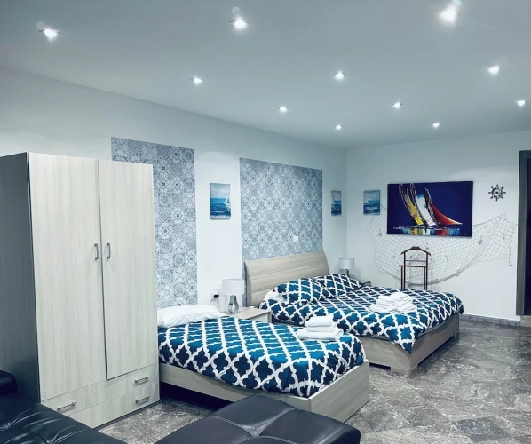 Deluxe Triple room with balcony and with courtyard view