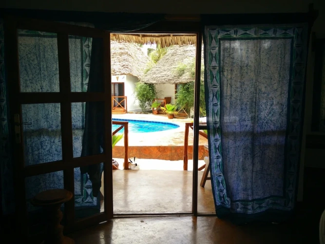 Standard Triple room with balcony and with pool view