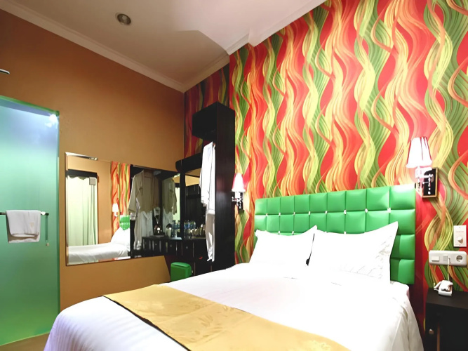 Amos Cozy Hotel & Convention Hall