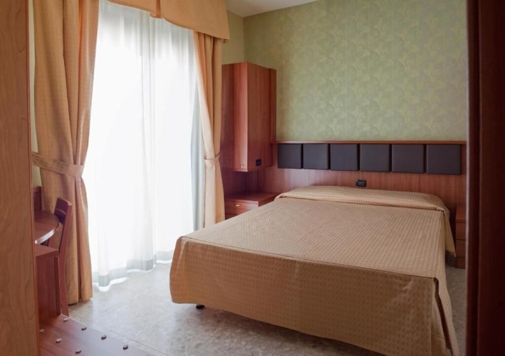 Superior Quadruple room with balcony and with city view