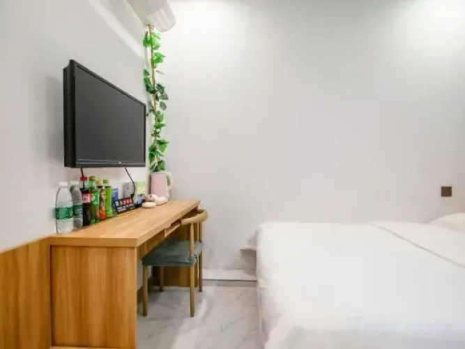 Daqing Boger Hotel (Xinmate Store)