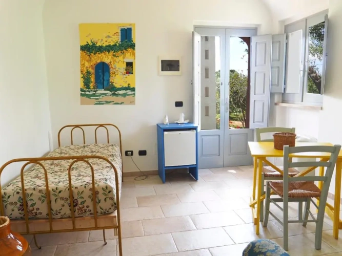 Standard Triple room with garden view