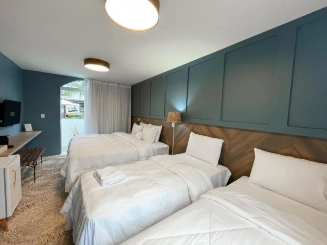 Standard Triple room with garden view