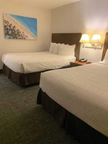 Standard Quadruple room with balcony and with partial ocean view