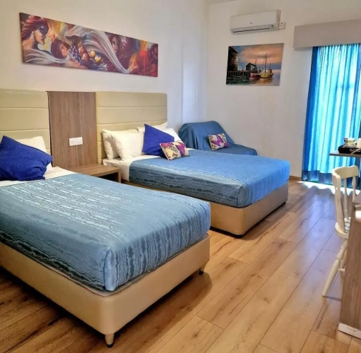 Comfort Quadruple room with balcony and with pool view