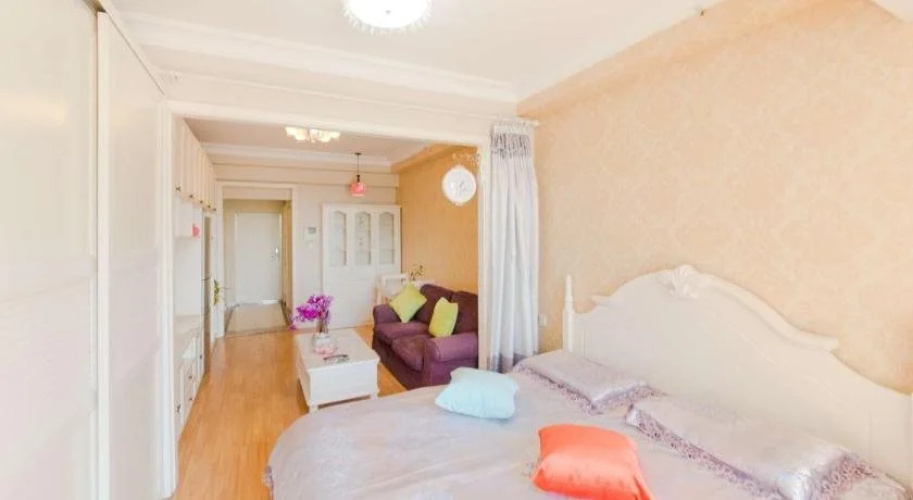 Aiqinhai ApartHotel