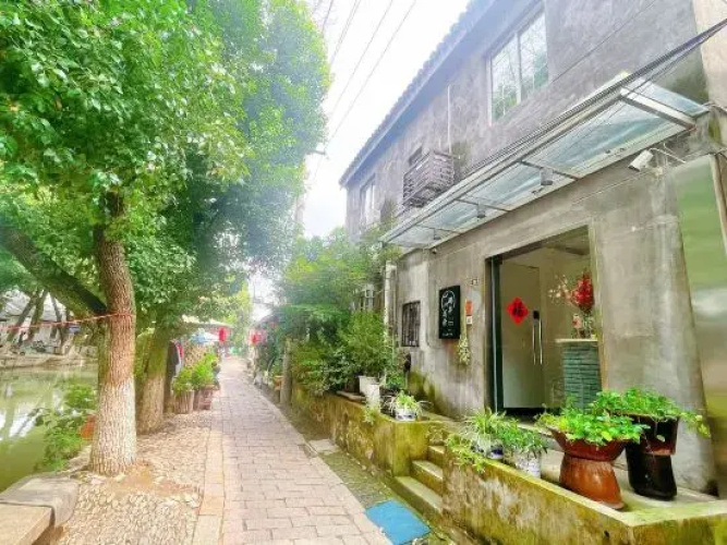 Tongli Flower Hotel(同里那年花开客栈)