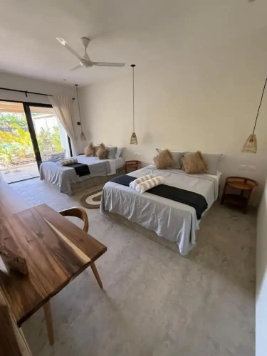 Standard Quadruple room with garden view