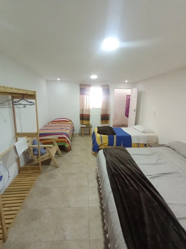 Standard Triple room with garden view