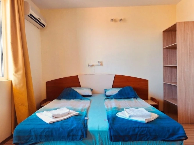 Standard Triple room with partial sea view