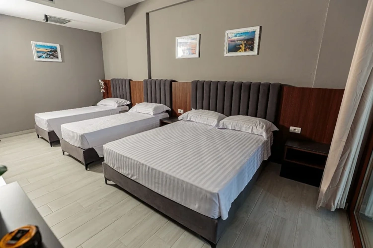 Standard Quadruple room with balcony and with sea view