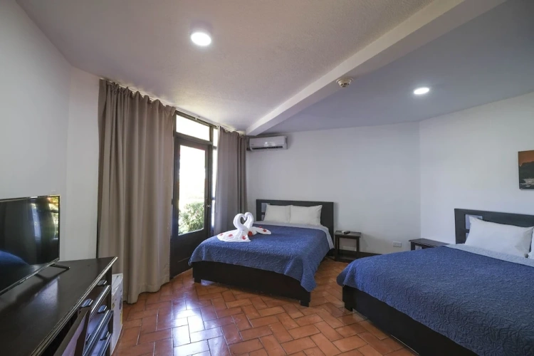 Superior Quadruple room with balcony and with pool view