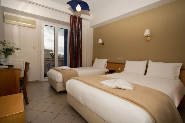 Standard Triple room with balcony and with city view