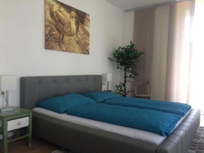 Apartment pool and lakeOver view