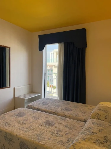 Classic Quadruple room with partial sea view