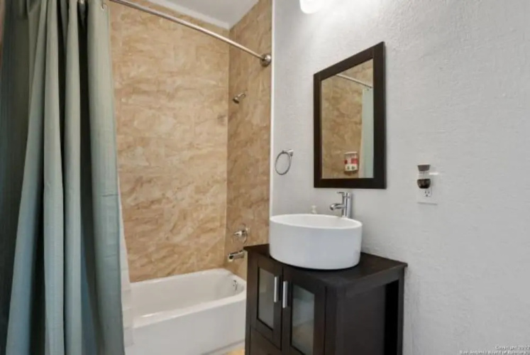 Experience Serenity in a 4BR 3BA Downtown Home