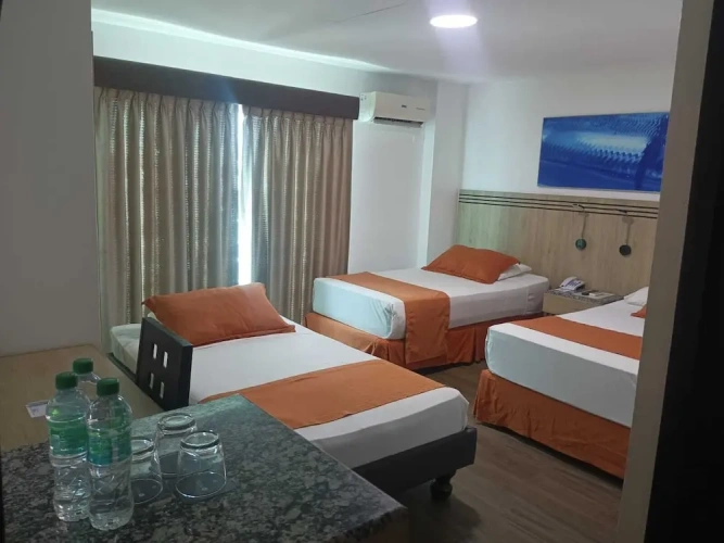 Standard Triple Family room with balcony and with city view