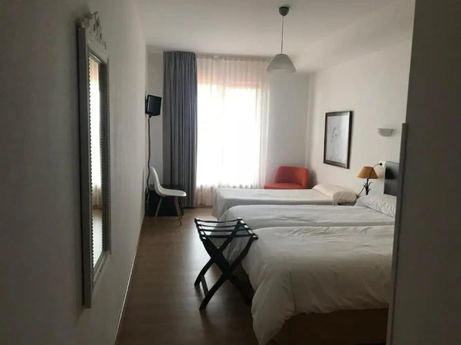 Standard Triple room with balcony