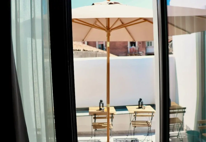 Superior Quadruple room with balcony and with courtyard view