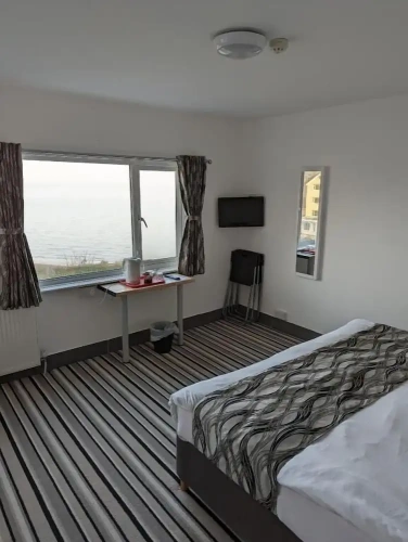 Standard Triple room with sea view