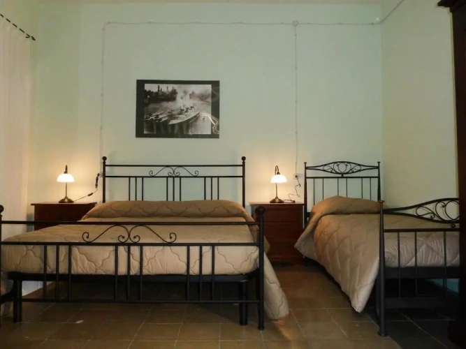Standard Triple room with garden view