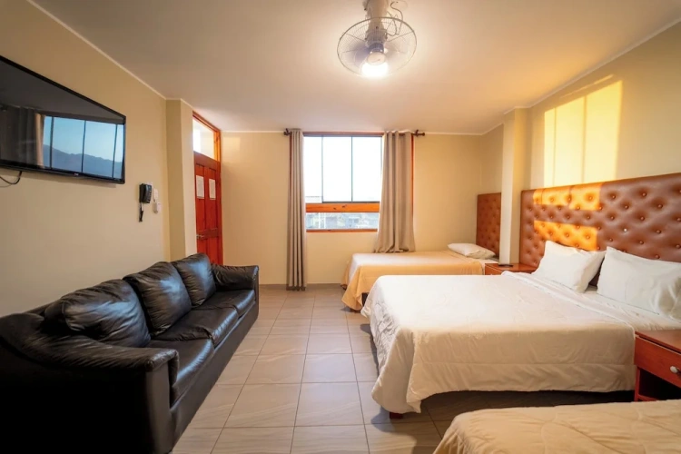 Standard Quadruple Family room with balcony and with garden view