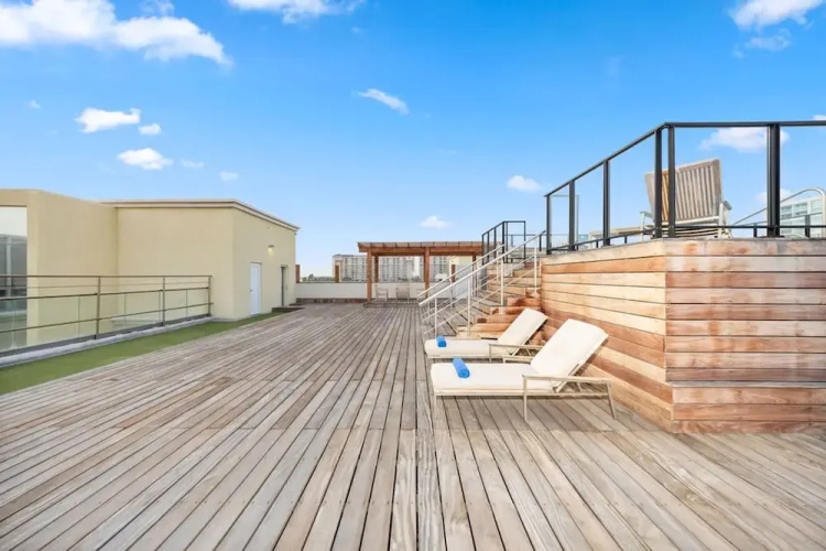 Modern Corner Unit Pool Steps From Palm Beach