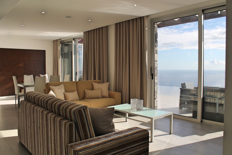Modern cliff-top villa, panoramic sea-views, A/C, heated pool | Cliffscape