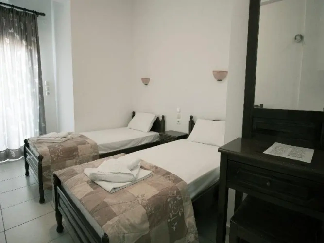 Classic Triple room with balcony and with garden view