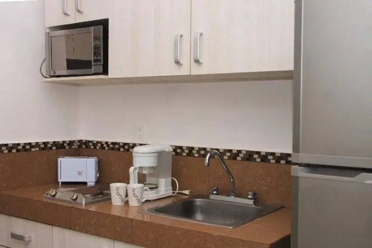 Xell Suites & Hotel