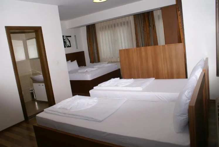 Standard Quadruple room with balcony and with city view