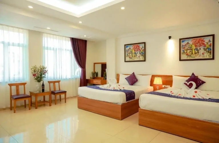 Superior Quadruple room with balcony and with city view