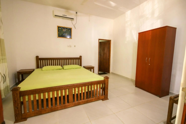 Green White Deluxe Room