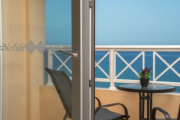 Superior Triple room with balcony and with sea view