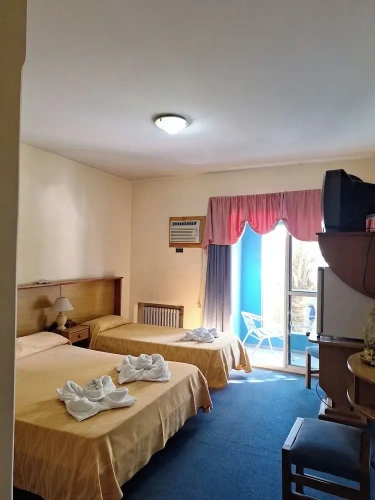 Standard Triple room with balcony and with city view