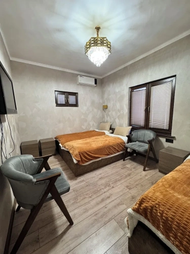 Standard Triple room with courtyard view
